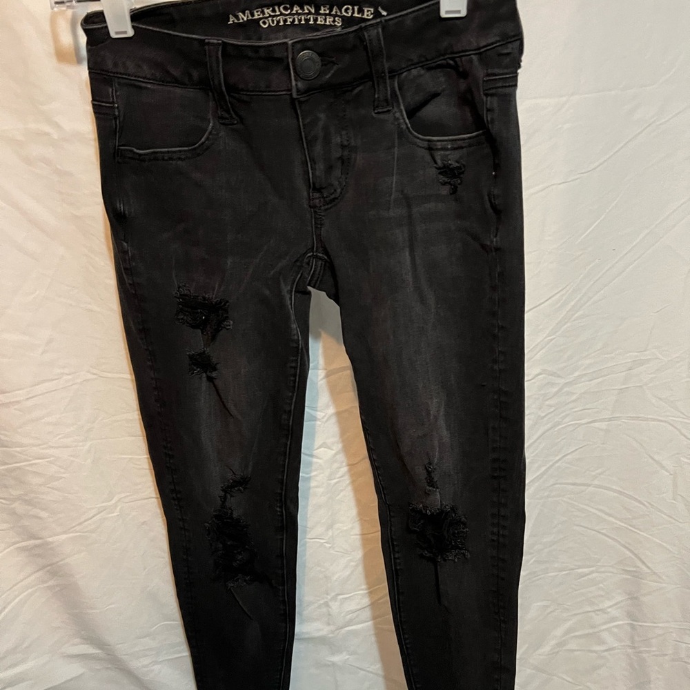 AMERICAN EAGLE Super Stretch X4 Distressed Jeans super low rise jeggings Size 0